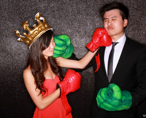 Funny couple doing boxing in the photobooth!
